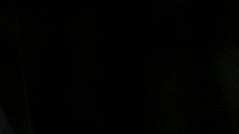 A California Highway Patrol officer sits in his car Thursday, Dec. 3, 2015, near the scene where a police shootout with suspects took place on Wednesday, in San Bernardino, Calif. A heavily armed man and woman opened fire Wednesday on a holiday banquet for his co-workers, killing multiple people and seriously wounding others in a precision assault, authorities said. Hours later, they died in the shootout with police. (AP Photo/Jae C. Hong)