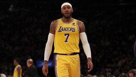 Los Angeles Lakers forward Carmelo Anthony (7) walks on the court against the New York Knicks during the first half of an NBA basketball game on Tuesday, Nov. 23, 2021, in New York. (AP Photo/Jim McIsaac)