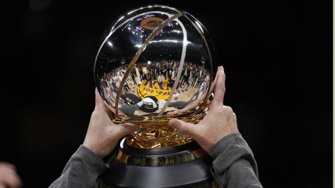 The conference championship trophy, won by the Denver Nuggets, is lifted after Game 4 of the NBA basketball Western Conference Final series between the Los Angeles Lakers and the Denver Nuggets Monday, May 22, 2023, in Los Angeles. (AP Photo/Ashley Landis)