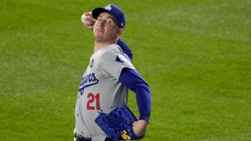 Los Angeles Dodgers pitcher Walker Buehler warms up before Game 3 of the baseball World Series against the New York Yankees, Monday, Oct. 28, 2024, in New York. (AP Photo/Frank Franklin II)