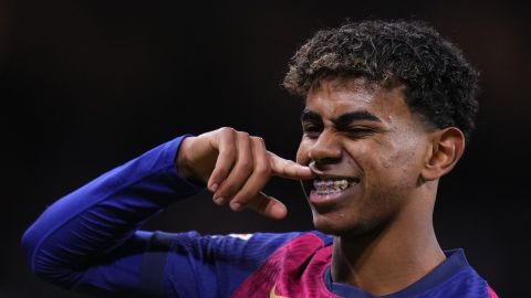 Barcelona's Lamine Yamal celebrates after scoring his side's third goal during the Spanish La Liga soccer match between Real Madrid and Barcelona at the Santiago Bernabeu stadium in Madrid, Spain, Saturday, Oct. 26, 2024. (AP Photo/Manu Fernandez)