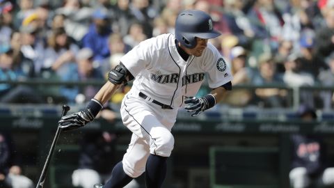 FILE - Seattle Mariners' Ichiro Suzuki heads to first base after hitting a single against the Cleveland Indians during the third inning of a baseball game March 31, 2018, in Seattle. (AP Photo/Ted S. Warren, File)