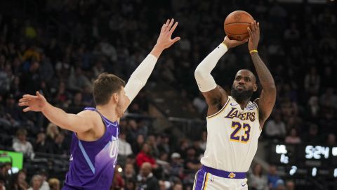 Los Angeles Lakers forward LeBron James (23) shoots the ball as Utah Jazz center Walker Kessler defends during the first half of an NBA basketball game, on Sunday, Dec. 1, 2024, in Salt Lake City. (AP Photo/Bethany Baker)