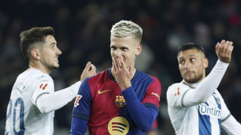 Barcelona's Dani Olmo, centre, reacts during the Spanish La Liga soccer match between Barcelona and Leganes at the Lluis Companys Olympic Stadium in Barcelona, Spain, Sunday, Dec. 15, 2024. (AP Photo/Joan Monfort)