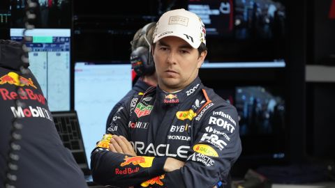 FILE - Red Bull driver Sergio Perez, of Mexico, waits in the garage area prior to a practice session for the Formula One U.S. Grand Prix auto race, Thursday, Nov. 21, 2024, in Las Vegas. (AP Photo/Matt York, File)