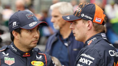 FILE- Red Bull driver Max Verstappen of the Netherlands, right, who clocked the fastest time, speaks with Red Bull driver Sergio Perez of Mexico , who clocked the third fastest time during qualification ahead of the Formula One Grand Prix at the Spa-Francorchamps racetrack in Spa, Belgium, Saturday, July 27, 2024. (AP Photo/Geert Vanden Wijngaert, File0