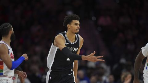 San Antonio Spurs' Victor Wembanyama reacts during an NBA basketball game, Monday, Dec. 23, 2024, in Philadelphia. (AP Photo/Matt Slocum)