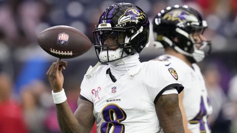 Baltimore Ravens quarterback Lamar Jackson warms up before an NFL football game against the Houston Texans, Wednesday, Dec. 25, 2024, in Houston. (AP Photo/David J. Phillip)