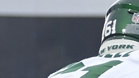 New York Jets quarterback Aaron Rodgers (8) is sacked by Buffalo Bills defensive end AJ Epenesa, right, in the end zone for a safety during the first half of an NFL football game, Sunday, Dec. 29, 2024, in Orchard Park, N.Y. (AP Photo/Adrian Kraus)