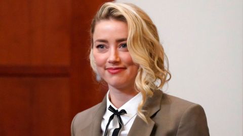 Amber Heard arrives into the courtroom after a break at the Fairfax County Circuit Courthouse in Fairfax, Va., Monday, May 23, 2022. Actors Johnny Depp and Heard have settled their defamation lawsuits following a high-profile trial earlier this year in which the former couple accused each other of physical and verbal abuse. Heard announced the settlement Monday, Dec. 19, on social media. (AP Photo/Steve Helber, Pool, File)