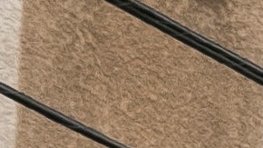 Los Angeles firefighters pack up after a fire at an apartment complex in the Sun Valley area of Los Angeles, Thursday, March 23, 2023. The fire in the Sun Valley area erupted at midday and flames were lapping up from a second-floor unit to the third floor when firefighters arrived, Fire Department spokesperson Margaret Stewart said in a statement. Several residents took refuge on top-floor balconies while firefighters attacked the flames. (AP Photo/Richard Vogel)