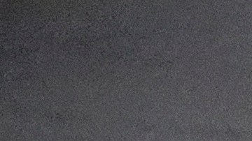 An Amazon employee puts packages on to a conveyor belt at an Amazon's DAX7 delivery station during Amazon's annual Prime Day event on Tuesday, July 16, 2024, in South Gate, Calif. (AP Photo/Richard Vogel)