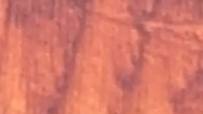 In this courtroom sketch, Sean Combs, center, is flanked by his defense attorney Marc Agnifilo, left, and Teny Garagos, in Manhattan Federal Court, Tuesday, Sept. 17, 2024, in New York. (Elizabeth Williams via AP)
