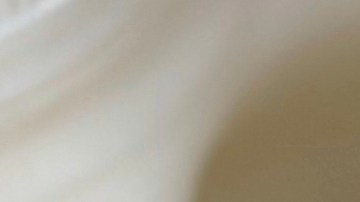 FILE - Bottles of raw milk are displayed for sale at a store in Temecula, Calif., on Wednesday, May 8, 2024. (AP Photo/JoNel Aleccia, file)