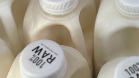 FILE - Bottles of raw milk are displayed for sale at a store in Temecula, Calif., on Wednesday, May 8, 2024. (AP Photo/JoNel Aleccia, file)