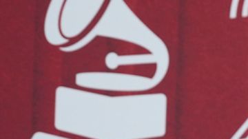 Luis Fonsi poses after winning an award for best pop vocal album at the 25th Latin Grammy Awards ceremony, Thursday, Nov. 14, 2024, in Miami. (AP Photo/Rebecca Blackwell)