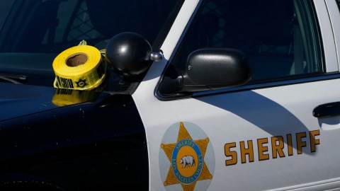 FILE - A roll of police tape is left on the windshield of a Los Angeles County sheriff's vehicle in the parking lot of its training academy in Whittier, Calif., Nov. 16, 2022. The Los Angeles County Sheriff’s Department released body camera footage on Friday, Dec. 29, showing a fatal shooting of a 27-year-old Black woman who had called to report domestic violence in early December. (AP Photo/Jae C. Hong, File)