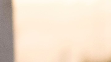 A member of the Mexican National Guard reviews cars as they line up to cross the border into the United States at the San Ysidro Port of Entry, Tuesday, Dec. 3, 2024, in Tijuana, Mexico. (AP Photo/Gregory Bull)