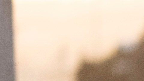 A member of the Mexican National Guard reviews cars as they line up to cross the border into the United States at the San Ysidro Port of Entry, Tuesday, Dec. 3, 2024, in Tijuana, Mexico. (AP Photo/Gregory Bull)