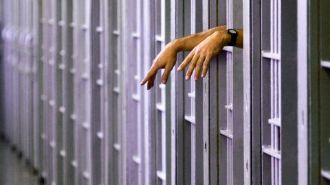 FILE - This Jan. 21, 2003 file photo shows an unidentified death row inmate in his cell in the North Condemned Unit at Pontiac Correctional Institution in Pontiac, Ill. On Friday, July 1, 2011, a ban that Gov. Pat Quinn signed into law in March took effect, shutting down Illinois' death row. It's a quiet last chapter to the story of capital punishment in Illinois, which captured the attention of the world in 2000 when then-Gov. George Ryan imposed a moratorium. Ryan cleared death row entirely three years later. Illinois has executed 12 men since 1977 when the death penalty was reinstated, the last one in 1999. (AP Photo/Seth Perlman, File)