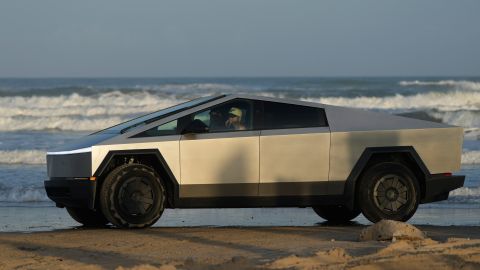 A Tesla Cybertruck moves along the beach in Boca Chica, Texas, Monday, Nov. 18, 2024. (AP Photo/Eric Gay)