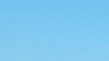 FILE - In this May 10, 2011 file photo, farm workers weed strawberry rows on a field outside Salinas, Calif. With temperatures climbing over 110 degrees recently in Californias crop abundant Central Valley and state regulators investigating four possible heat-related deaths in the fields, farmworker advocates are pushing for a bill that would strengthen the states already stringent heat illness regulations.  At least 16 farmworkers have died of heat-related causes since 2005 when California adopted the rules for providing shade and water. (AP Photo/Gosia Wozniacka, File)