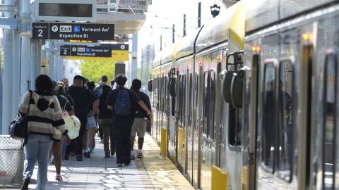 A Metro light rail train returns to service in Los Angeles, Tuesday, April 30, 2024. Officials say multiple people were hurt, and a few seriously, when a Metro light rail train and a University of Southern California shuttle bus collided in downtown Los Angeles. (AP Photo/Damian Dovarganes)