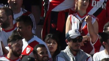 Argentina's River Plate fans cheer for their team prior the final soccer match of the Copa Libertadores against Argentina's Boca Juniors at the Antonio Vespucio Liberti stadium in Buenos Aires, Argentina, Saturday, Nov. 24, 2018. The final match of the Copa Libertadores has been pushed back after the bus carrying the Boca Juniors players was attacked by fans as it drove to the Antonio Vespucio Liberti stadium. (AP Photo/Ricardo Mazalan)