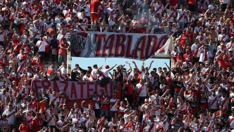 Argentina's River Plate fans cheer for their team prior the final soccer match of the Copa Libertadores against Argentina's Boca Juniors at the Antonio Vespucio Liberti stadium in Buenos Aires, Argentina, Saturday, Nov. 24, 2018. The final match of the Copa Libertadores has been pushed back after the bus carrying the Boca Juniors players was attacked by fans as it drove to the Antonio Vespucio Liberti stadium. (AP Photo/Ricardo Mazalan)