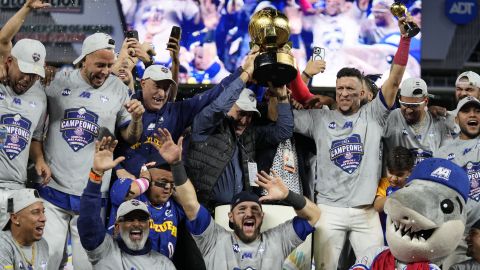 Venezuela players celebrate the team's 3-0 win over the Dominican Republic in the championship game of the baseball Caribbean Series, Friday, Feb. 9, 2024, in Miami. (AP Photo/Wilfredo Lee)