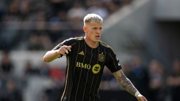 Los Angeles FC midfielder Mateusz Bogusz (19) runs during an MLS soccer match against the Seattle Sounders, Saturday, Feb. 24, 2024, in Los Angeles. (AP Photo/Kyusung Gong)