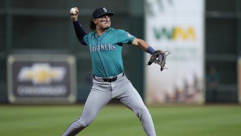 Seattle Mariners third baseman Josh Rojas throws out Houston Astros' Jose Altuve on a ground ball during the first inning of a baseball game Monday, Sept. 23, 2024, in Houston. (AP Photo/Kevin M. Cox)