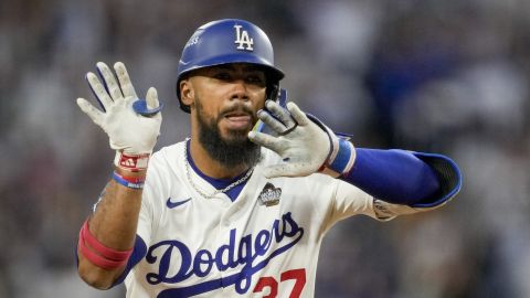 Los Angeles Dodgers' Teoscar Hernández celebrates his two-run home run against the New York Yankees during the third inning in Game 2 of the baseball World Series, Saturday, Oct. 26, 2024, in Los Angeles. (AP Photo/Ashley Landis)