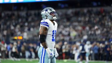 Dallas Cowboys linebacker Micah Parsons stands on the field during warmups before a football game against the Tampa Bay Buccaneers Sunday, Dec. 22, 2024, in Arlington, Texas. (AP Photo/Jeffrey McWhorter)