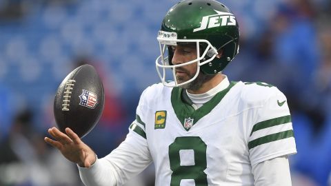 New York Jets quarterback Aaron Rodgers (8) warms up before an NFL football game against the Buffalo Bills in Orchard Park, N.Y., Sunday, Dec. 29, 2024. (AP Photo/Adrian Kraus)