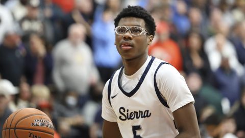 FILE - Sierra Canyon's Bryce James #5 warms up against Christopher Columbus at halftime during a high school basketball game at the Hoophall Classic, on January 16, 2023, in Springfield, MA. (AP Photo/Gregory Payan, File)