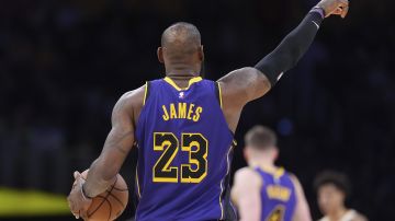 Los Angeles Lakers forward LeBron James gestures during the second half of an NBA basketball game against the Atlanta Hawks, Friday, Jan. 3, 2025, in Los Angeles. (AP Photo/Mark J. Terrill)