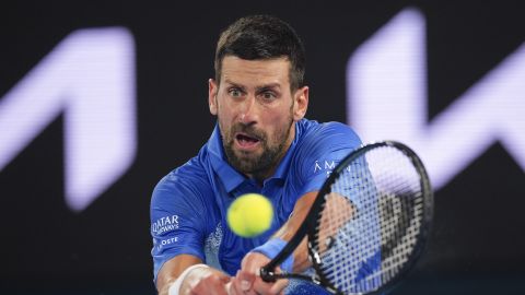 Serbia's Novak Djokovic plays a backhand return to Germany's Alexander Zverev during an exhibition match ahead of the Australian Open tennis championship in Melbourne, Australia, Thursday, Jan. 9, 2025. (AP Photo/Vincent Thian)