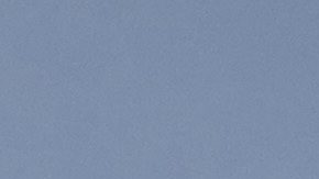 A person walks amidst debris as smoke rises from the Palisades Fire on Friday, Jan. 10, 2025, in the Pacific Palisades section of Los Angeles. (AP Photo/John Locher)