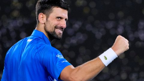 Novak Djokovic of Serbia reacts after defeating Jaime Faria of Portugal in their second round match at the Australian Open tennis championship in Melbourne, Australia, Wednesday, Jan. 15, 2025. (AP Photo/Vincent Thian)