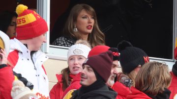 Taylor Swift watches from a suite during the first half of an NFL football AFC divisional playoff game between the Kansas City Chiefs and the Houston Texans, Saturday, Jan. 18, 2025, in Kansas City, Mo. (AP Photo/Travis Heying)