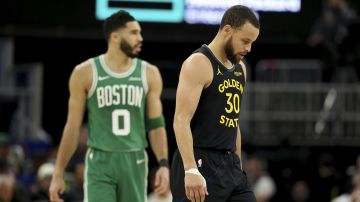 Golden State Warriors guard Stephen Curry (30) stands on the court during the first half of an NBA basketball game against the Boston Celtics in San Francisco, Monday, Jan. 20, 2025. (AP Photo/Jed Jacobsohn)