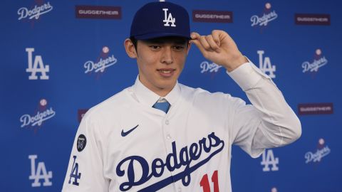 Japanese right-hander pitcher Roki Sasaki, 23, poses as he is introduced by the Los Angeles Dodgers at a news conference at Dodger Stadium Wednesday, Jan. 22, 2025 in Los Angeles. (AP Photo/Damian Dovarganes)