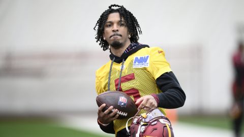 Washington Commanders quarterback Jayden Daniels (5) works out during NFL football practice, Friday, Jan. 24, 2025, in Ashburn, Va. (AP Photo/Nick Wass)