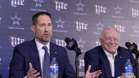 Dallas Cowboys new head coach Brian Schottenheimer, left, responds to a question as team owner Jerry Jones, right, smiles during a news conference at the team's headquarters in Frisco, Texas, Monday, Jan. 27, 2025. (AP Photo/Tony Gutierrez)