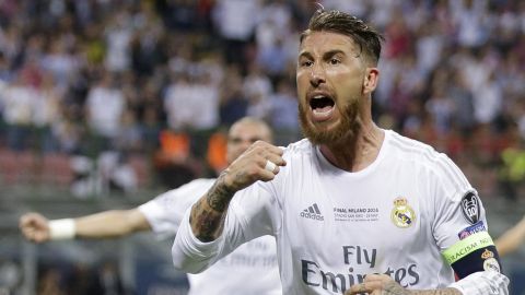 Real Madrid's Sergio Ramos celebrates after scoring his side's first goal during the Champions League final soccer match between Real Madrid and Atletico Madrid at the San Siro stadium in Milan, Italy, Saturday, May 28, 2016. (AP Photo/Andrew Medichini)