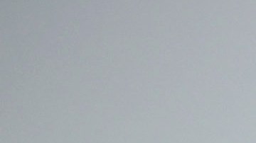 Kevin Marshall sifts through his mother's fire-ravaged property in the the Palisades Fire in the Pacific Palisades neighborhood of Los Angeles, Saturday, Jan. 11, 2025. (AP Photo/John Locher)