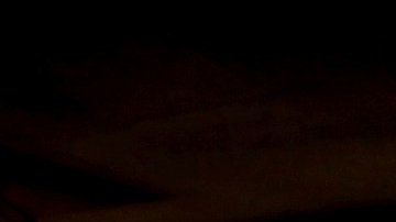 Residents embrace in front of a fire-ravaged property after the Palisades Fire swept through in the Pacific Palisades neighborhood of Los Angeles, Wednesday, Jan. 8, 2025. (AP Photo/Etienne Laurent)