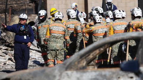 Search and rescue crews from Mexico inspect a mobile home park destroyed by the Palisades Fire in Palisades, Calif., Wednesday, Jan. 15, 2025. (AP Photo/Ty ONeil)