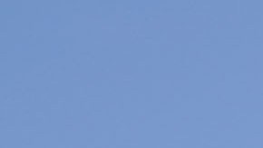 The letters “CJNG” for the group’s formal name, Jalisco New Generation Cartel, are scrawled on the facade of an abandoned home, in El Limoncito, in the Michoacan state of Mexico, Saturday, Oct. 30, 2021. The cartel based in Jalisco state is invading neighboring Michoacan, causing thousands of farmers to flee, with some seeking asylum in the United States. (AP Photo/Eduardo Verdugo)